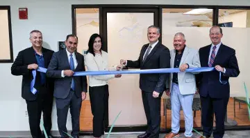 Group photo of leaders from South Shore Health, Aspire, and the Town of Weymouth pose for a photo at the Day Treatment Program ribbon cutting.